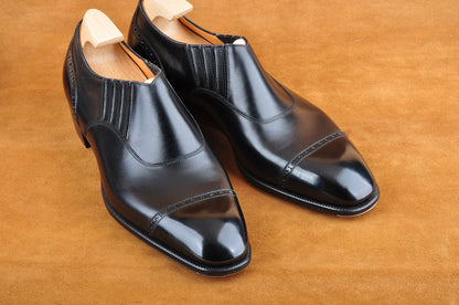 Wholecut Slip-On Loafer in Black