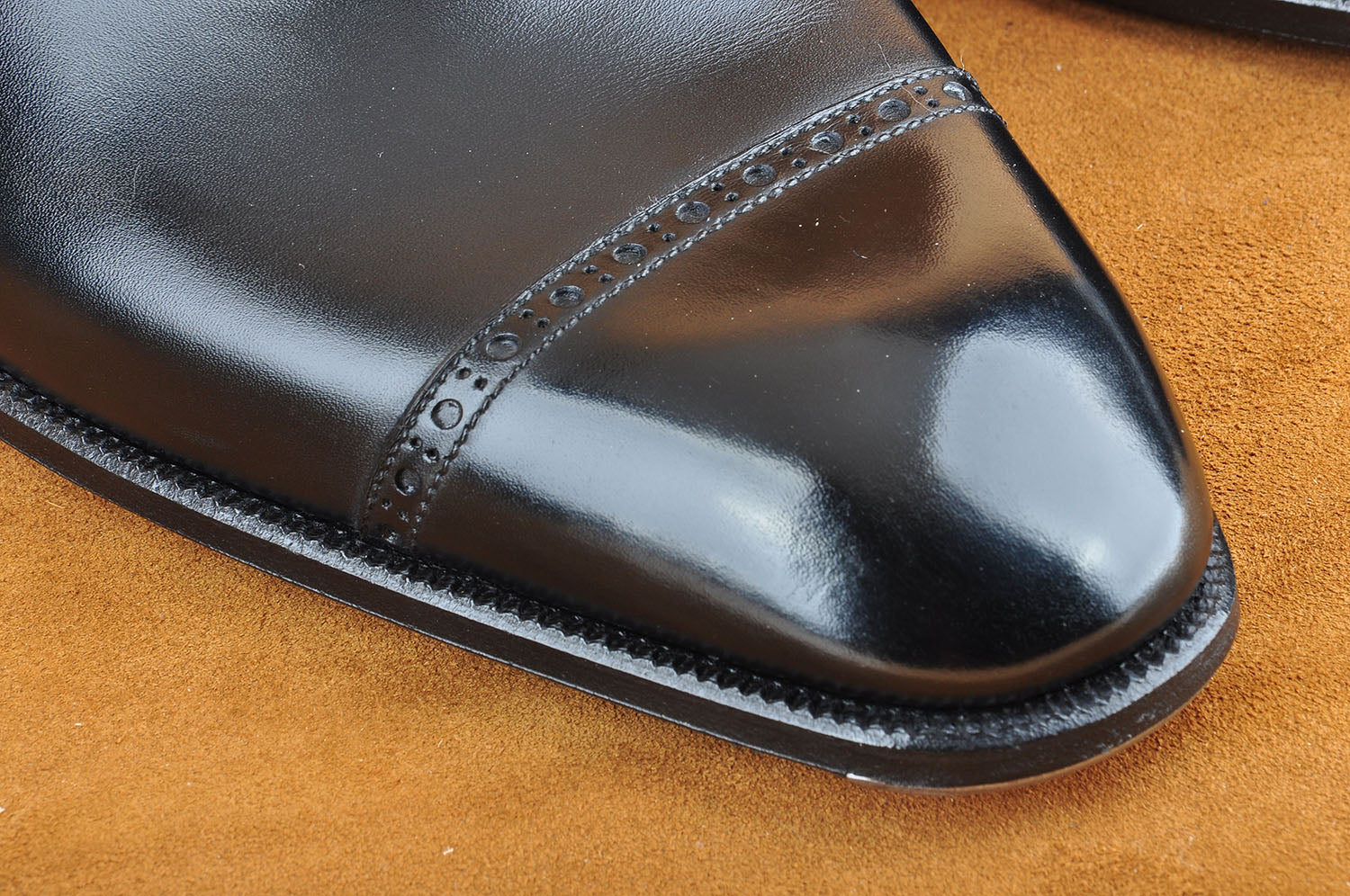 Wholecut Slip-On Loafer in Black